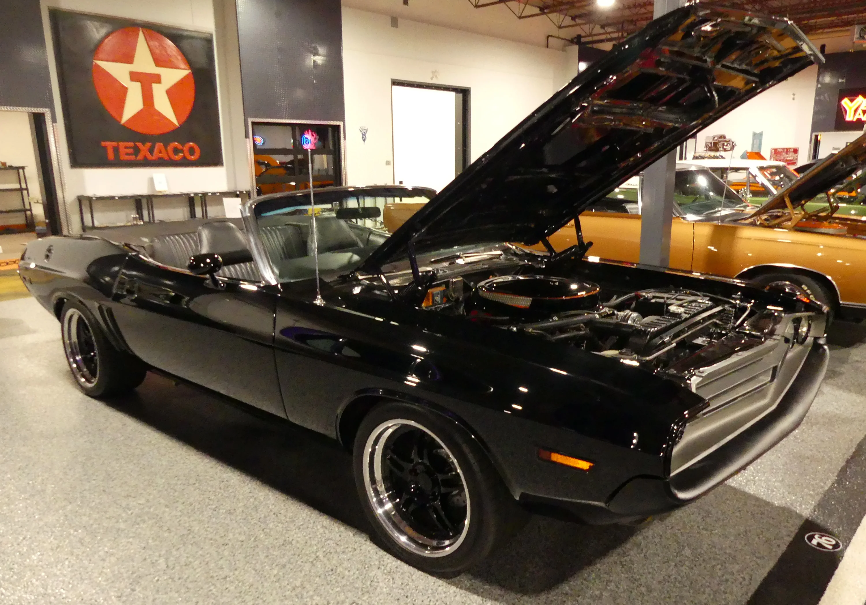 1970 Plymouth Cuda:
                                        Only one Vitamin C Cuda convertible exists. This is a clone car of the original that sold at Barret Jackson in 2008 for $2M US.
